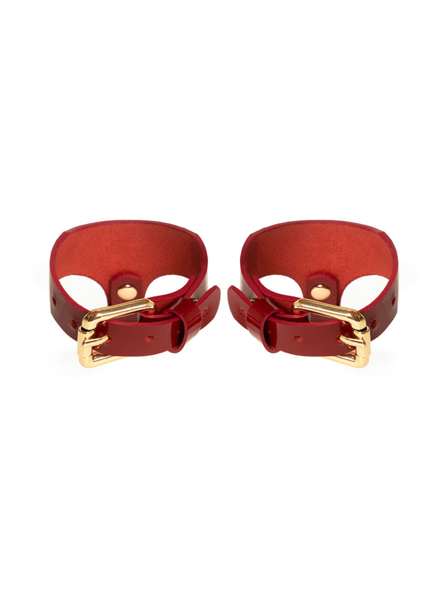 Omni cuffs in Patent leather